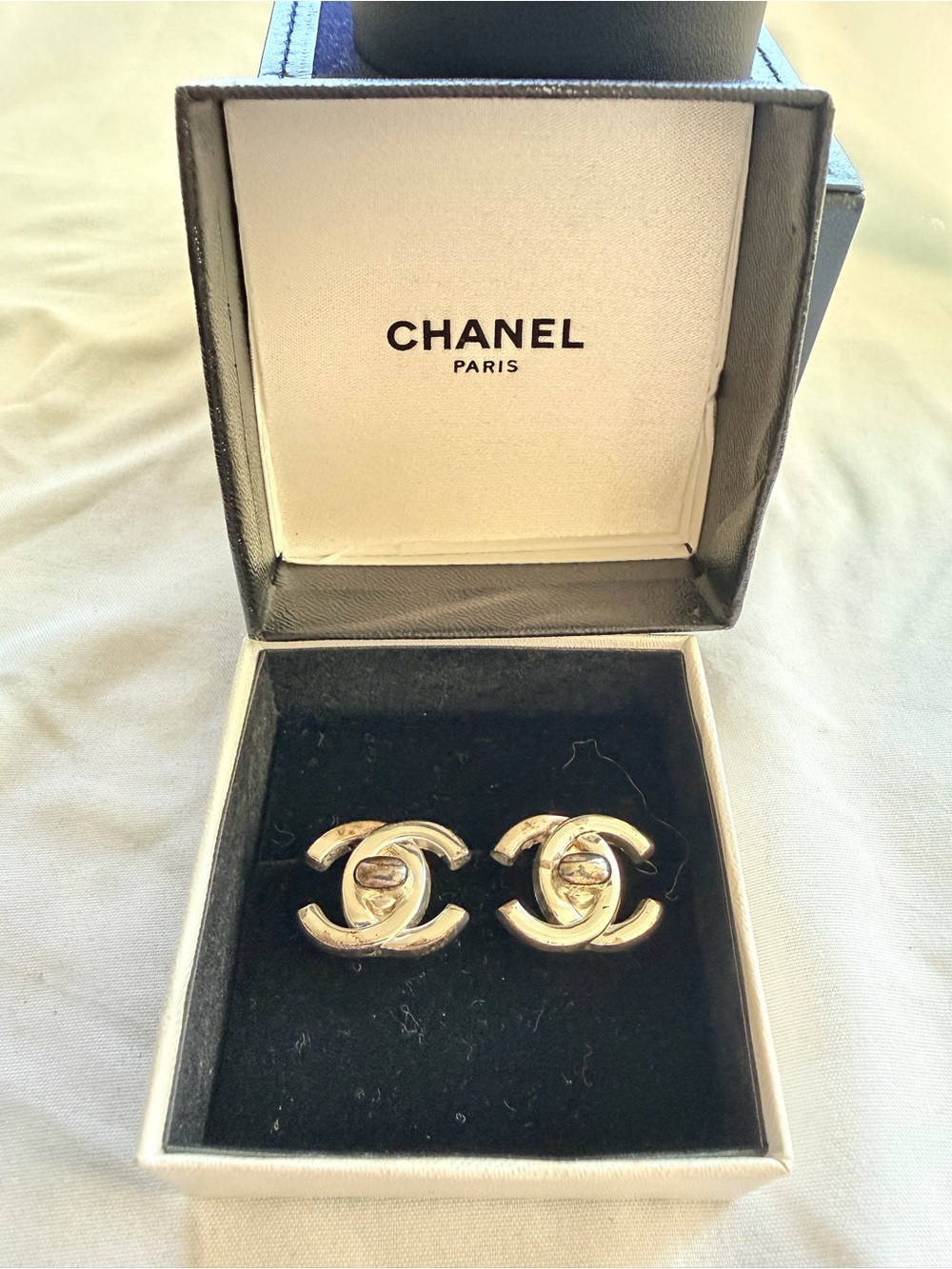 CHANEL Silver CC Logo Turnlock Clip-On Earrings